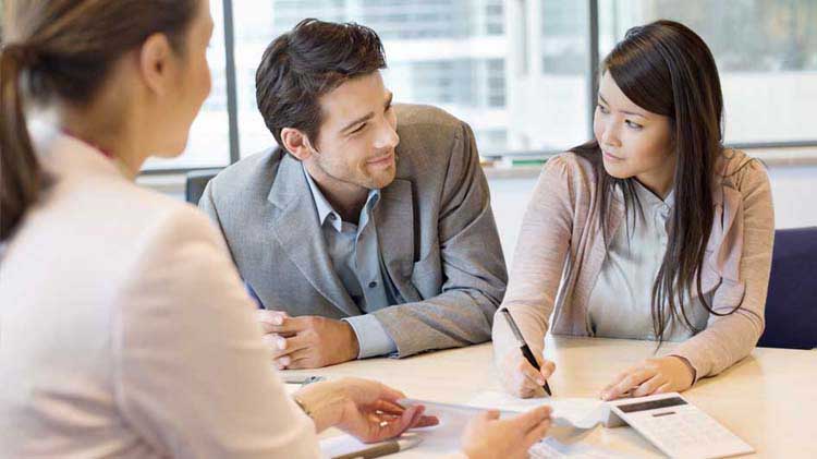 Young woman co-signing a loan for a family member.