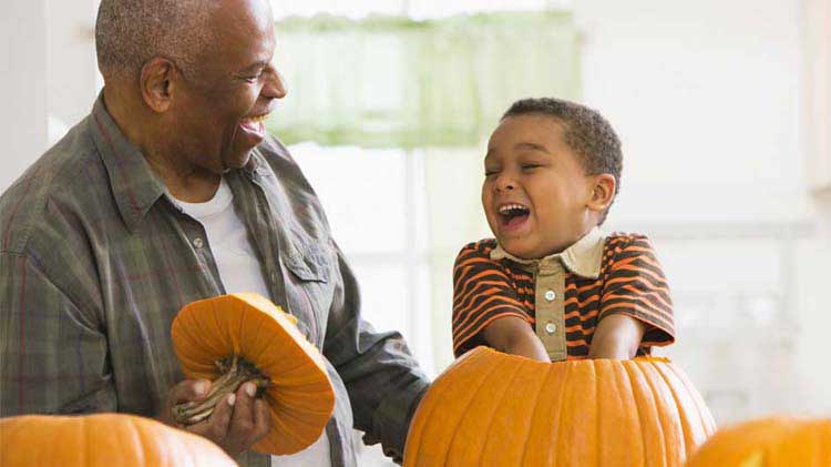 Safe pumpkin carving with small child.