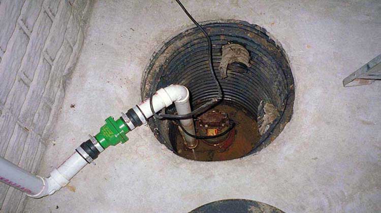 A sump pump in a basement.