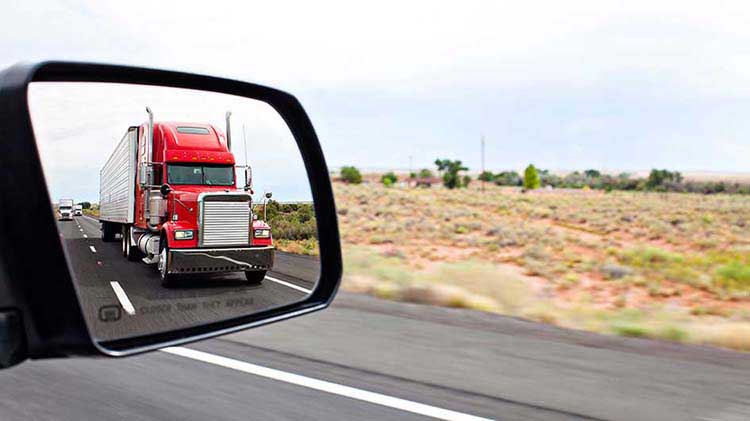 Truck in side mirror