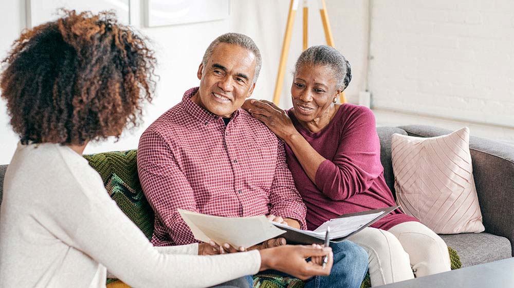 Couple discussing estate planning.