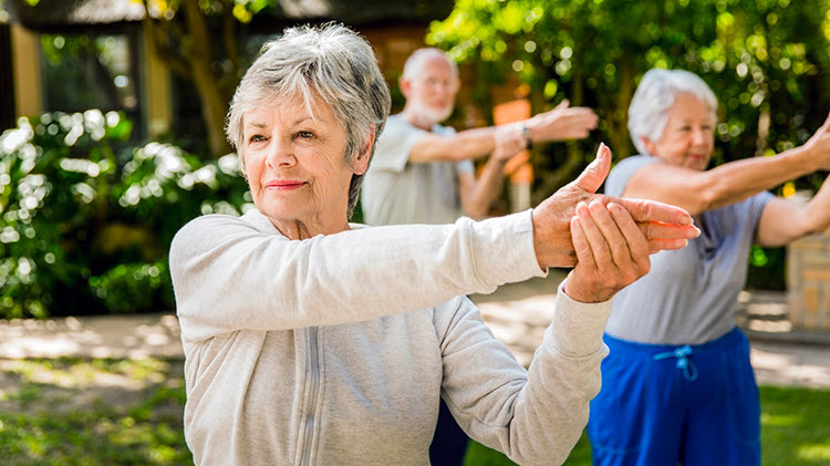 Woman exercising in a retirement community.