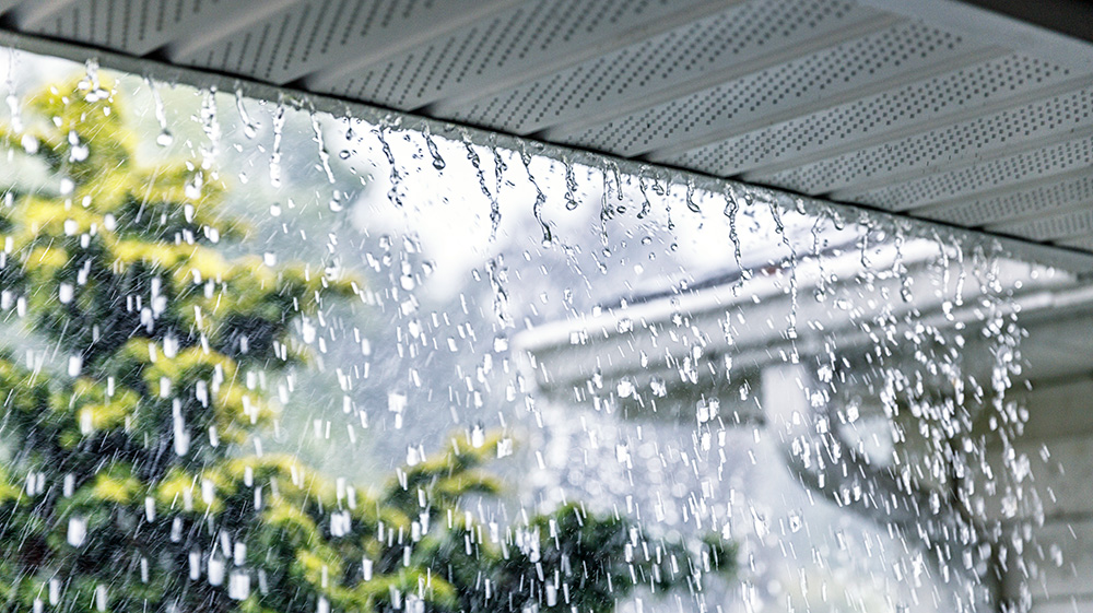 Rain running off impact-resistant roof.