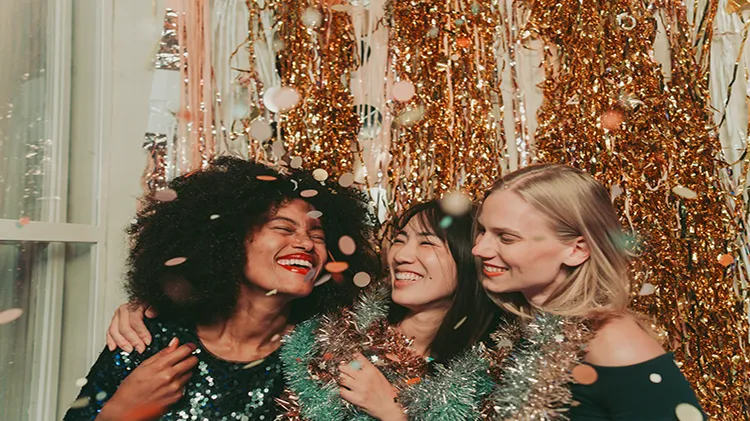Friends celebrate New Year’s Eve safely at home.