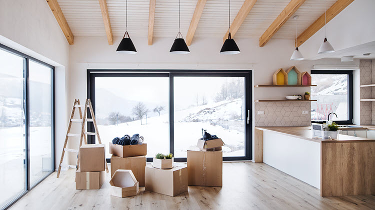 Moving boxes in the kitchen on a winter day.