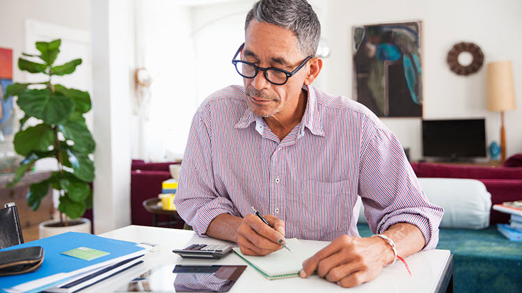 Man reviewing his retirement income plan.