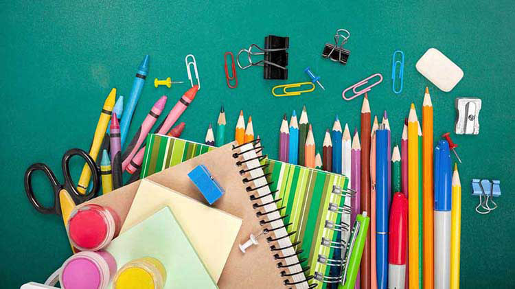 School supplies consisting of crayons, scissors, paint, eraser, notebooks, colored pencils, paper clips, markers, etc.