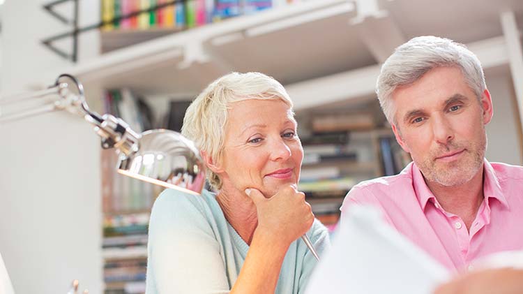 Two business owners preparing for the insurance audit.