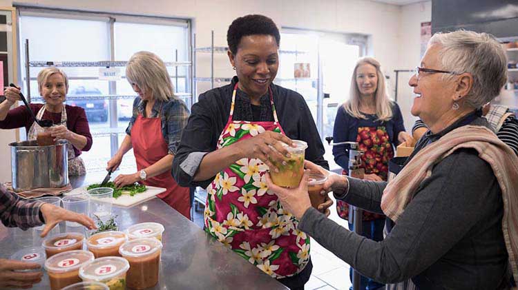 People volunteering at a charity.