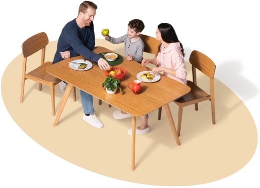 Family of three enjoys a meal at the dining room table.