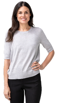 Woman with one hand on hip