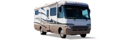 A white motorhome viewed from the front side.