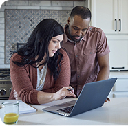Couple looking at laptop
