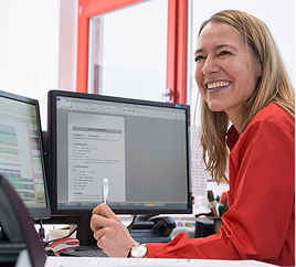 couple looking at car damage