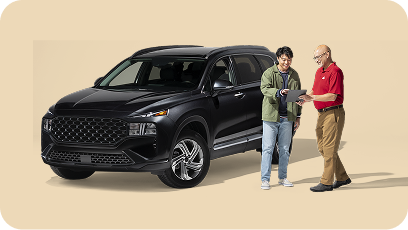 State Farm agent with customer in front of car